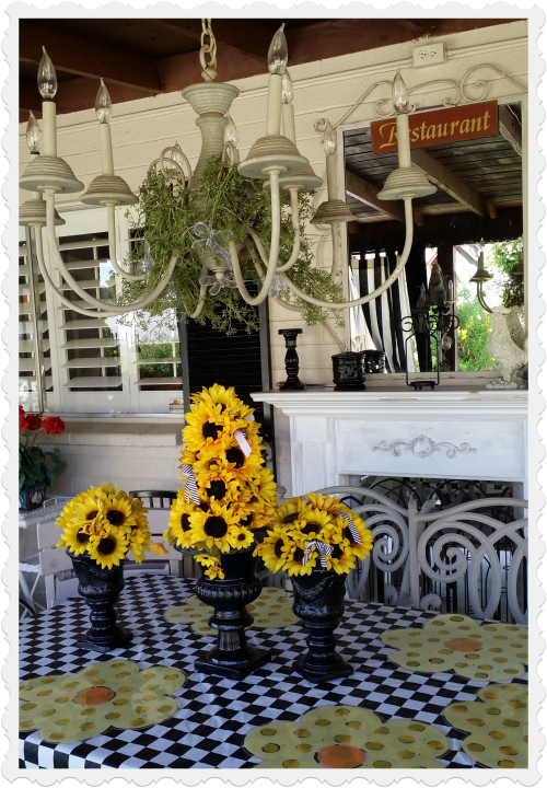 Black and white patio theme with chandelier